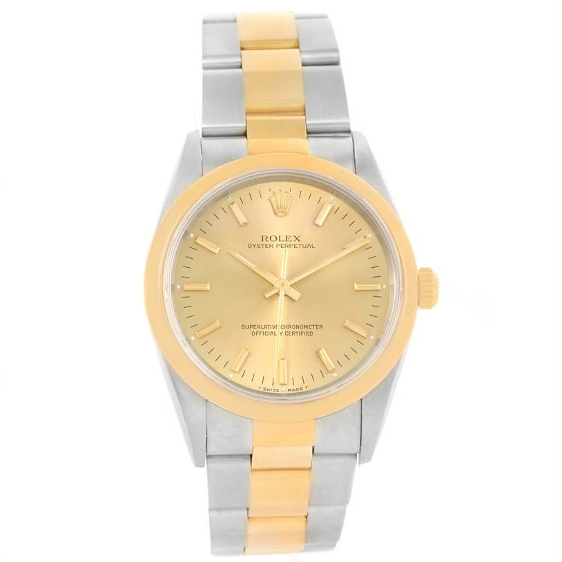 This Rolex Oyster Perpetual 14203 Men's Steel and Gold (two tone) Champagne Dial 14203 Men's Steel and Gold (two tone) Champagne Dial watch is shown from a front angle, displaying the face, bezel, crown, and bracelet.