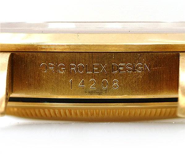 This image shows a close-up of the side engraving on a Rolex Oyster Perpetual 14208 Men's Yellow Gold Champagne Dial 14208 Men's Yellow Gold Champagne Dial watch case, featuring the model number 14208.