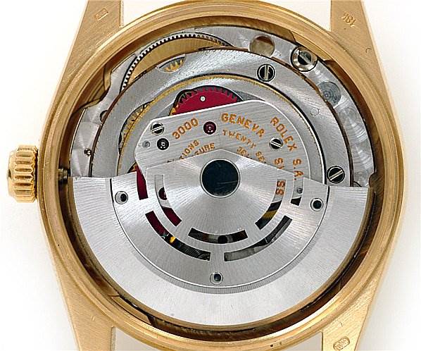 This image shows the internal mechanism of a Rolex Oyster Perpetual 14208 Men's Yellow Gold Champagne Dial 14208 Men's Yellow Gold Champagne Dial watch, viewed from the back.