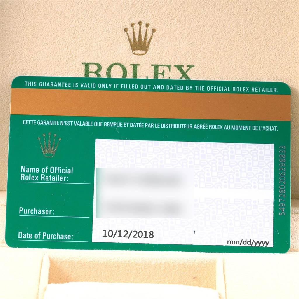 The image shows the warranty card of a Rolex Oyster Perpetual 114200 Men's Stainless Steel Burgundy Dial 114200 Men's Stainless Steel Burgundy Dial model, with retailer and purchase information.