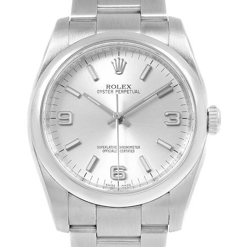 The image shows a Rolex Oyster Perpetual 116000 Men's Stainless Steel Silver Dial 116000 Men's Stainless Steel Silver Dial watch from a top-down angle, displaying its face, bezel, crown, and part of the bracelet.