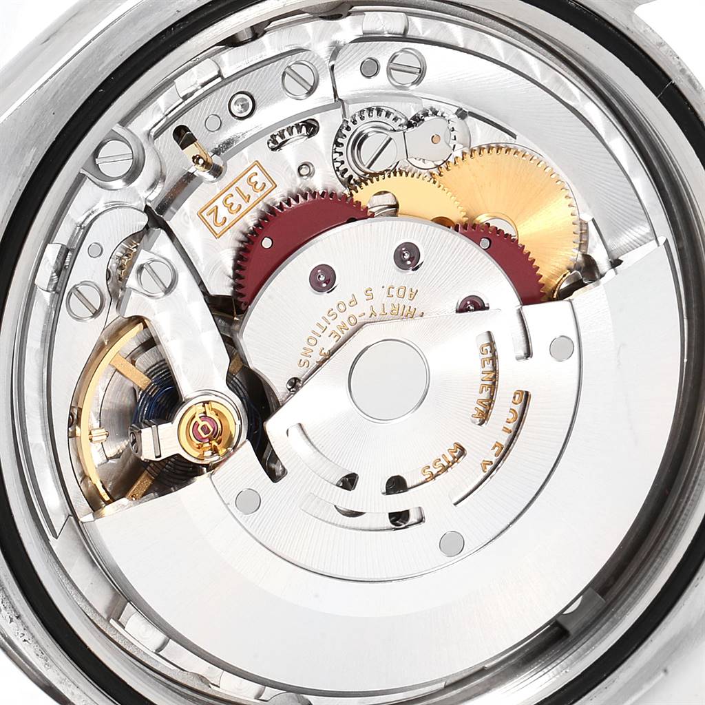 This is a close-up view of the movement and internal mechanics of the Rolex Oyster Perpetual 114300 Men's Stainless Steel Burgundy Dial 114300 Men's Stainless Steel Burgundy Dial model watch.