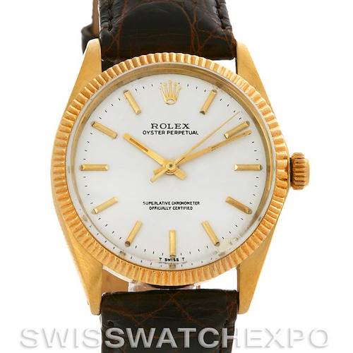 This image shows a front view of a Rolex Oyster Perpetual Men's Yellow Gold White Dial Men's Yellow Gold White Dial watch, highlighting its bezel, dial, crown, and leather strap.