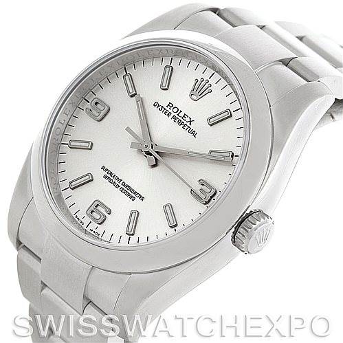 The image shows a Rolex Oyster Perpetual 116000 Men's Stainless Steel Silver Dial 116000 Men's Stainless Steel Silver Dial watch at an angled view with a focus on the face, bezel, and bracelet.