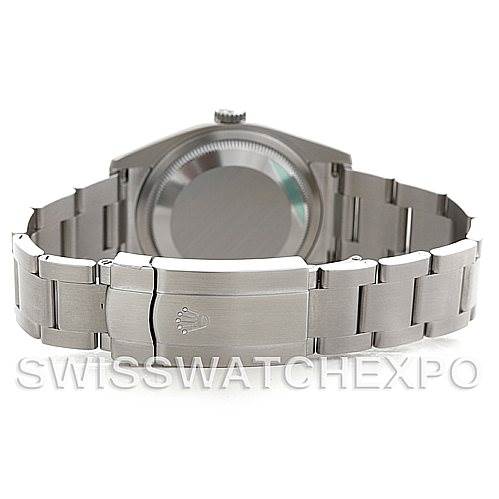 The image shows the back case and bracelet clasp of a Rolex Oyster Perpetual 116000 Men's Stainless Steel Silver Dial 116000 Men's Stainless Steel Silver Dial watch, viewed from the rear angle.