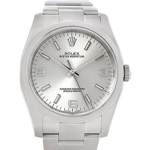 The image displays a front view of a Rolex Oyster Perpetual 116000 Men's Stainless Steel Silver Dial 116000 Men's Stainless Steel Silver Dial watch, showing the dial, hands, markers, crown, and part of the bracelet.