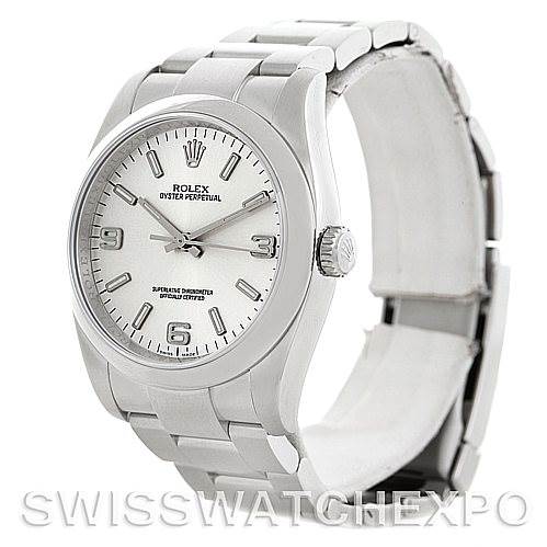 The image shows a Rolex Oyster Perpetual 116000 Men's Stainless Steel Silver Dial 116000 Men's Stainless Steel Silver Dial watch at an angle, displaying the dial, crown, and bracelet.