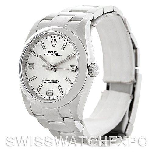The image shows a Rolex Oyster Perpetual 116000 Men's Stainless Steel Silver Dial 116000 Men's Stainless Steel Silver Dial watch at an angle, displaying the dial, crown, and bracelet.