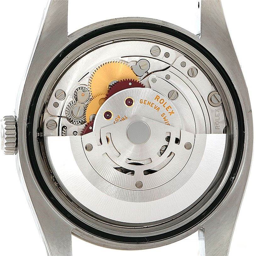 This image shows the internal mechanism of a Rolex Oyster Perpetual 116034 Men's Stainless Steel Black Dial 116034 Men's Stainless Steel Black Dial watch from a back angle with the case removed.