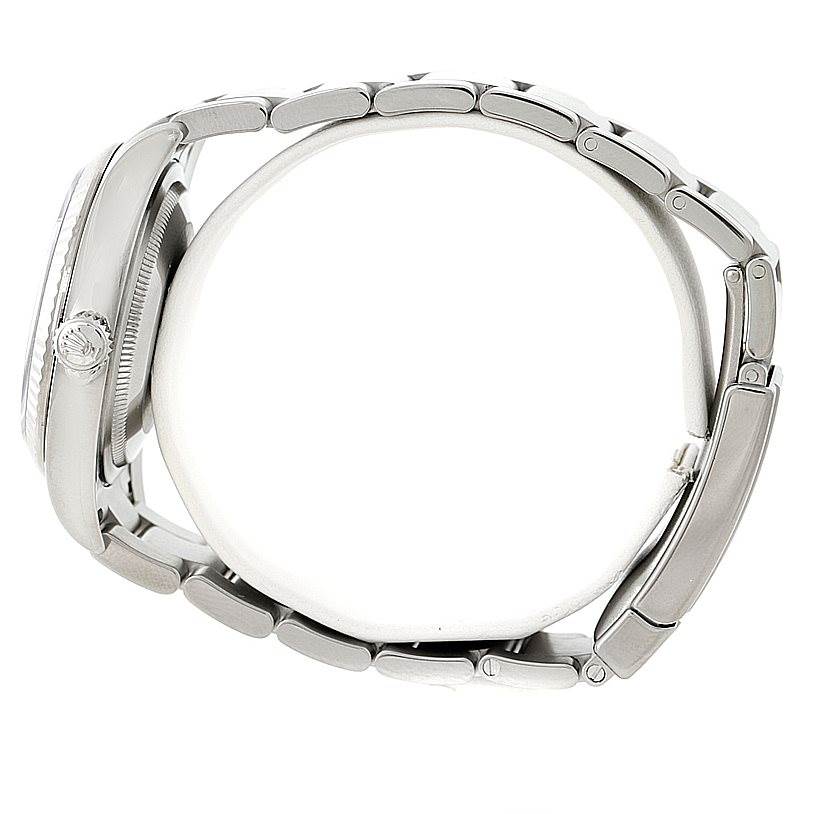 This image shows a side view of a Rolex Oyster Perpetual 116034 Men's Stainless Steel Black Dial 116034 Men's Stainless Steel Black Dial watch, highlighting the crown and bracelet links.