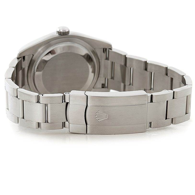 The image shows the back case and bracelet clasp of a Rolex Oyster Perpetual 116034 Men's Stainless Steel Black Dial 116034 Men's Stainless Steel Black Dial watch at a rear angle.