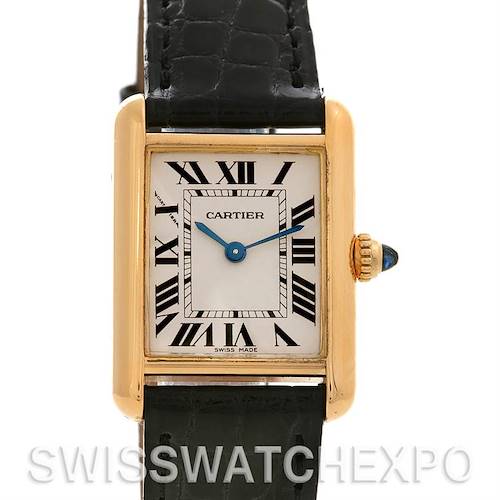 The image shows a Tank Louis Cartier watch front view, highlighting the face, blue hands, and a black strap.