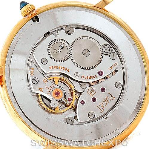 The image shows the open case back of a Piaget 9035 Men's Yellow Gold White Dial 9035 Men's Yellow Gold White Dial 18K Yellow Gold Mechanical Men's Watch 9035 model, revealing its intricate movement.