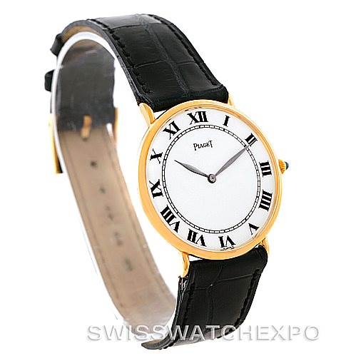 The image shows a side angle of the Piaget 9035 Men's Yellow Gold White Dial 9035 Men's Yellow Gold White Dial 18K Yellow Gold Mechanical Men's Watch 9035, displaying the face, bezel, and leather strap.