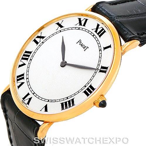 The image shows a Piaget 9035 Men's Yellow Gold White Dial 9035 Men's Yellow Gold White Dial 18K Yellow Gold Mechanical Men's Watch, model 9035, viewed from an angled front perspective highlighting its dial and crown.