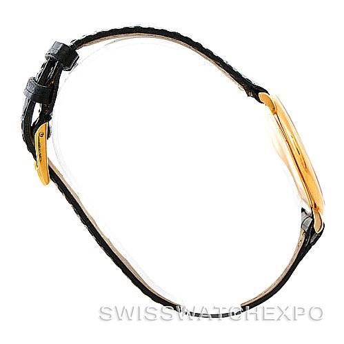 The image shows a side profile of the Piaget 9035 Men's Yellow Gold White Dial 9035 Men's Yellow Gold White Dial 18K Yellow Gold Mechanical Men's Watch 9035, highlighting its gold case and black strap.