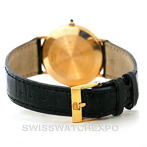 The image shows the back case and clasp of the Piaget 9035 Men's Yellow Gold White Dial 9035 Men's Yellow Gold White Dial 18K Yellow Gold Mechanical Mens Watch 9035 model, highlighting the black leather strap.