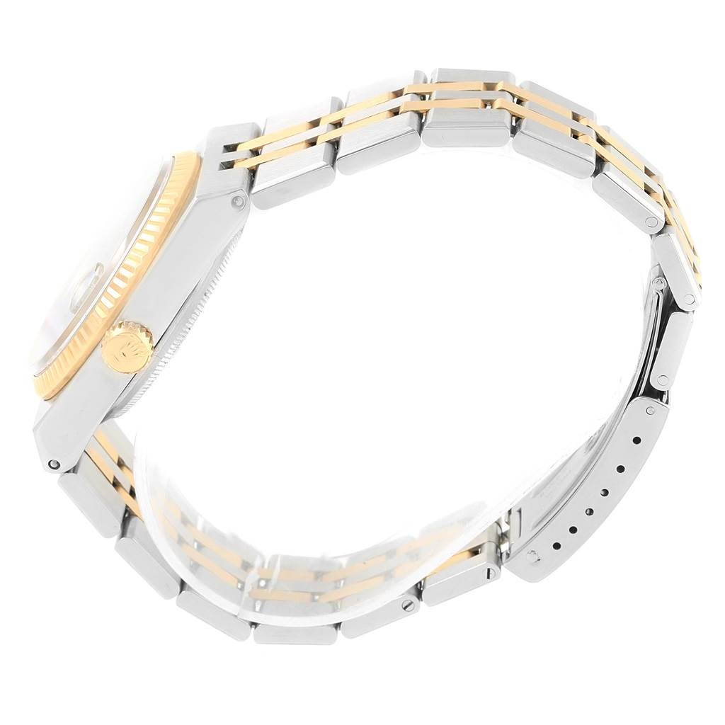 The image shows the side profile of a Rolex Oysterquartz 17013 Men's Stainless Steel Blue Dial 17013 Men's Stainless Steel Blue Dial watch, highlighting its bracelet, crown, and part of the case.