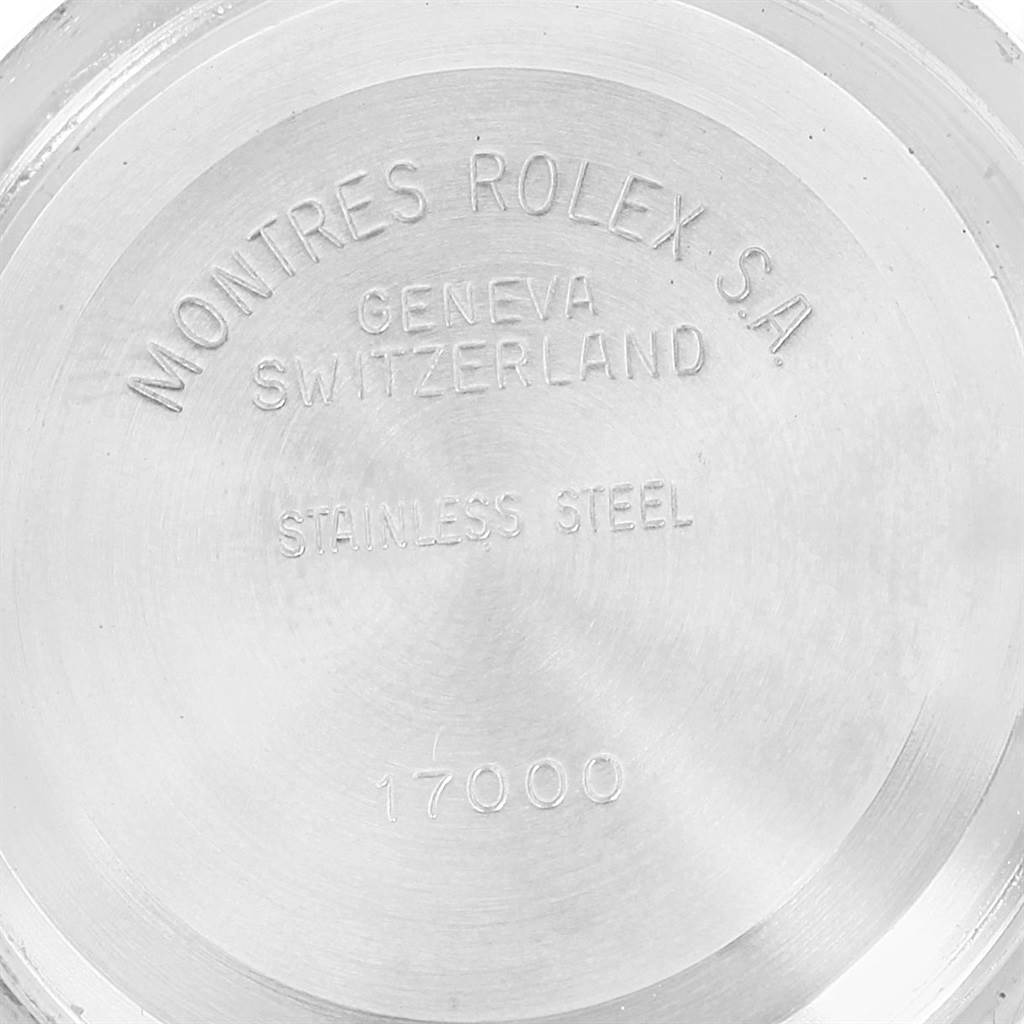 This image shows the case back of the Rolex Oysterquartz 17013 Men's Stainless Steel Blue Dial 17013 Men's Stainless Steel Blue Dial, displaying the brand, model, and material information.