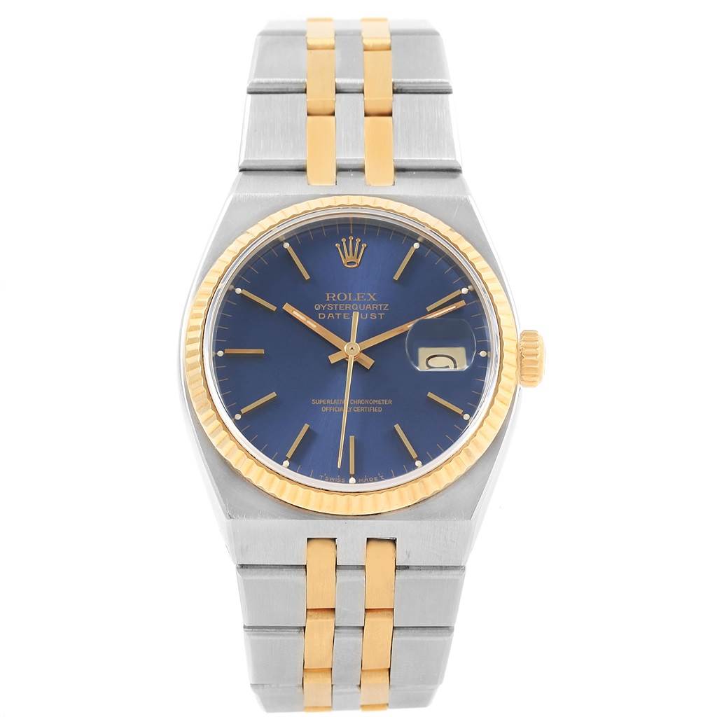 The image shows a frontal view of a Rolex Oysterquartz 17013 Men's Stainless Steel Blue Dial 17013 Men's Stainless Steel Blue Dial Datejust watch with a blue dial and a two-tone metal bracelet.