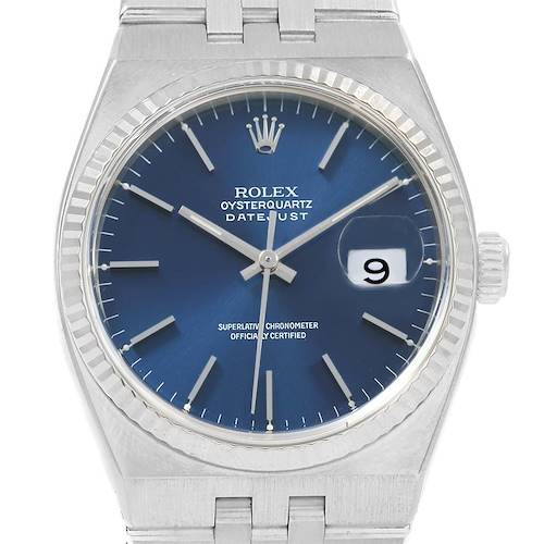 The image shows the face of a Rolex Oysterquartz 17014 Men's Stainless Steel Blue Dial 17014 Men's Stainless Steel Blue Dial Datejust watch, displaying its dial, hour markers, hands, and date window.