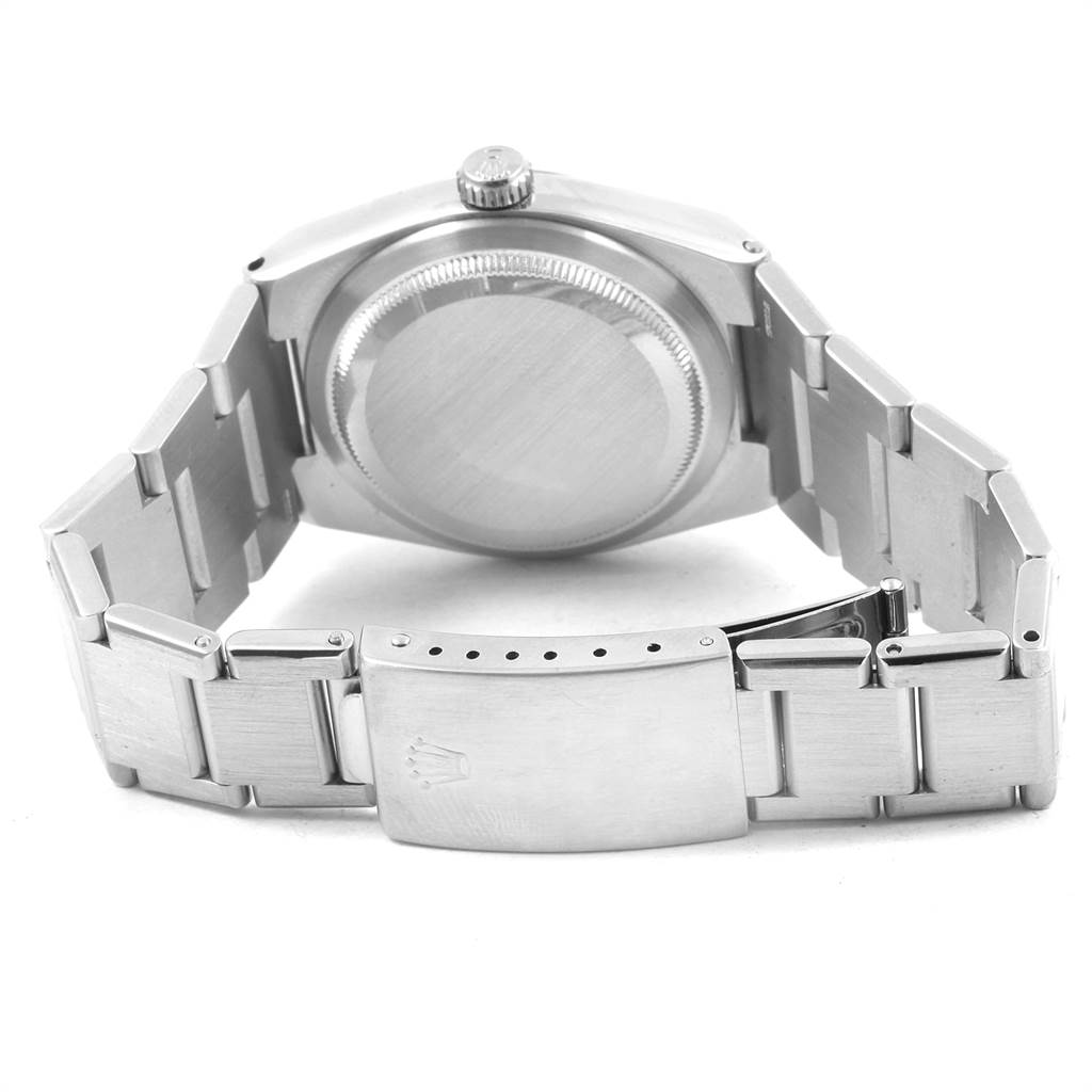 The image shows the back view of a Rolex Oysterquartz 17000 Men's Stainless Steel White Dial 17000 Men's Stainless Steel White Dial watch, highlighting the case back, crown, and metal bracelet with a clasp.