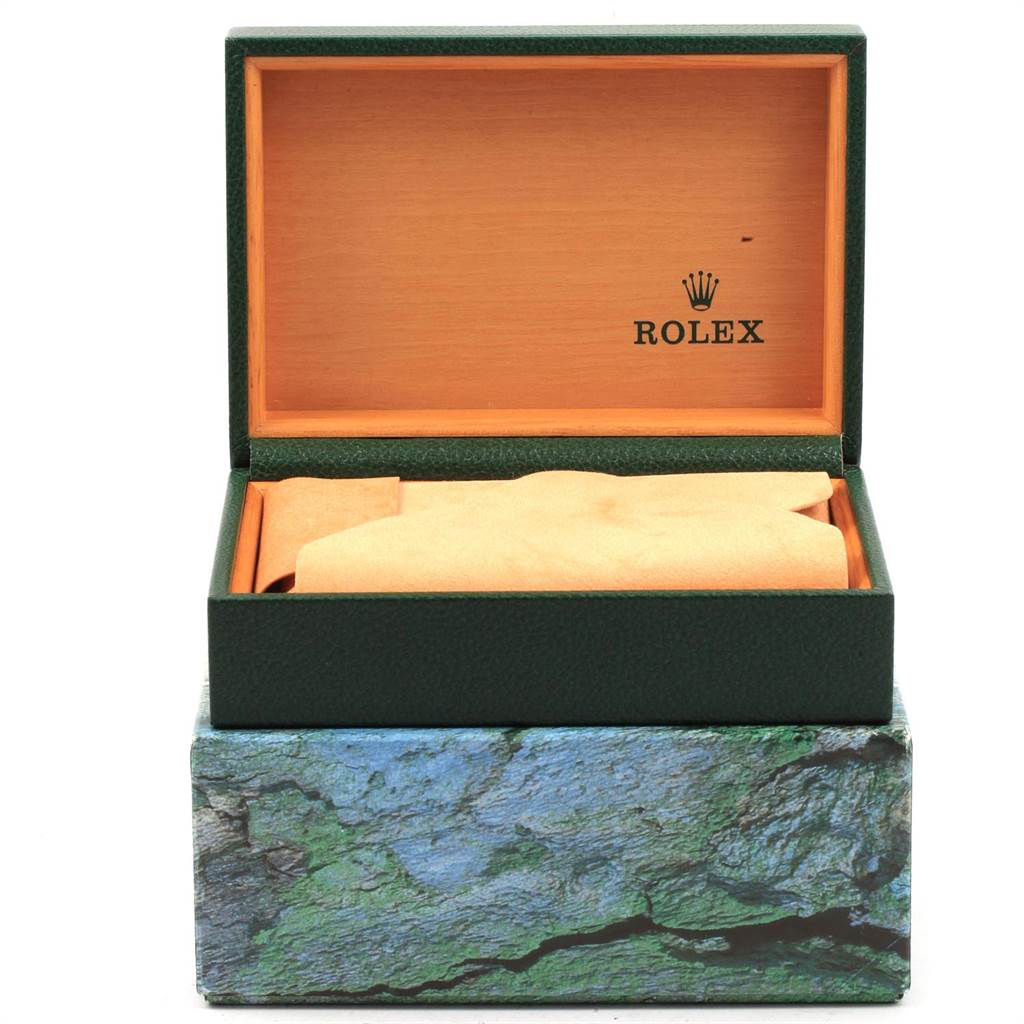This image shows an open Rolex box for the Oysterquartz model, revealing the interior cushion and branding.
