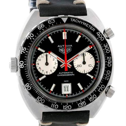 The image shows a front view of a Tag Heuer Autavia 1163 Men's Stainless Steel Black Dial 1163 Men's Stainless Steel Black Dial watch, displaying the dial, bezel, crown, chronograph subdials, and tachymeter.