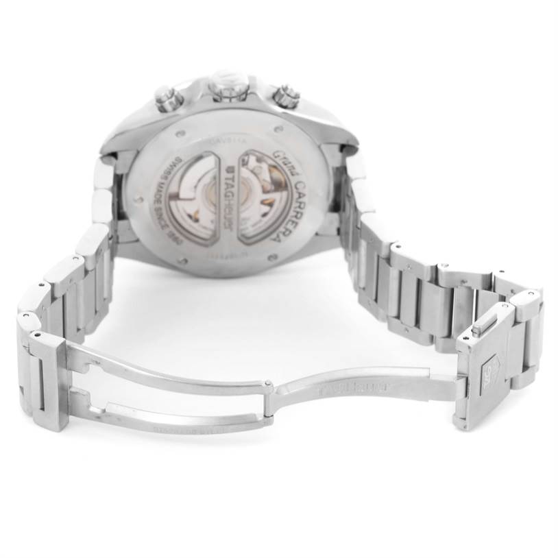 The image shows the back of a Tag Heuer Carrera CAV511A Men's Stainless Steel Black Dial CAV511A Men's Stainless Steel Black Dial watch and its open metal bracelet.