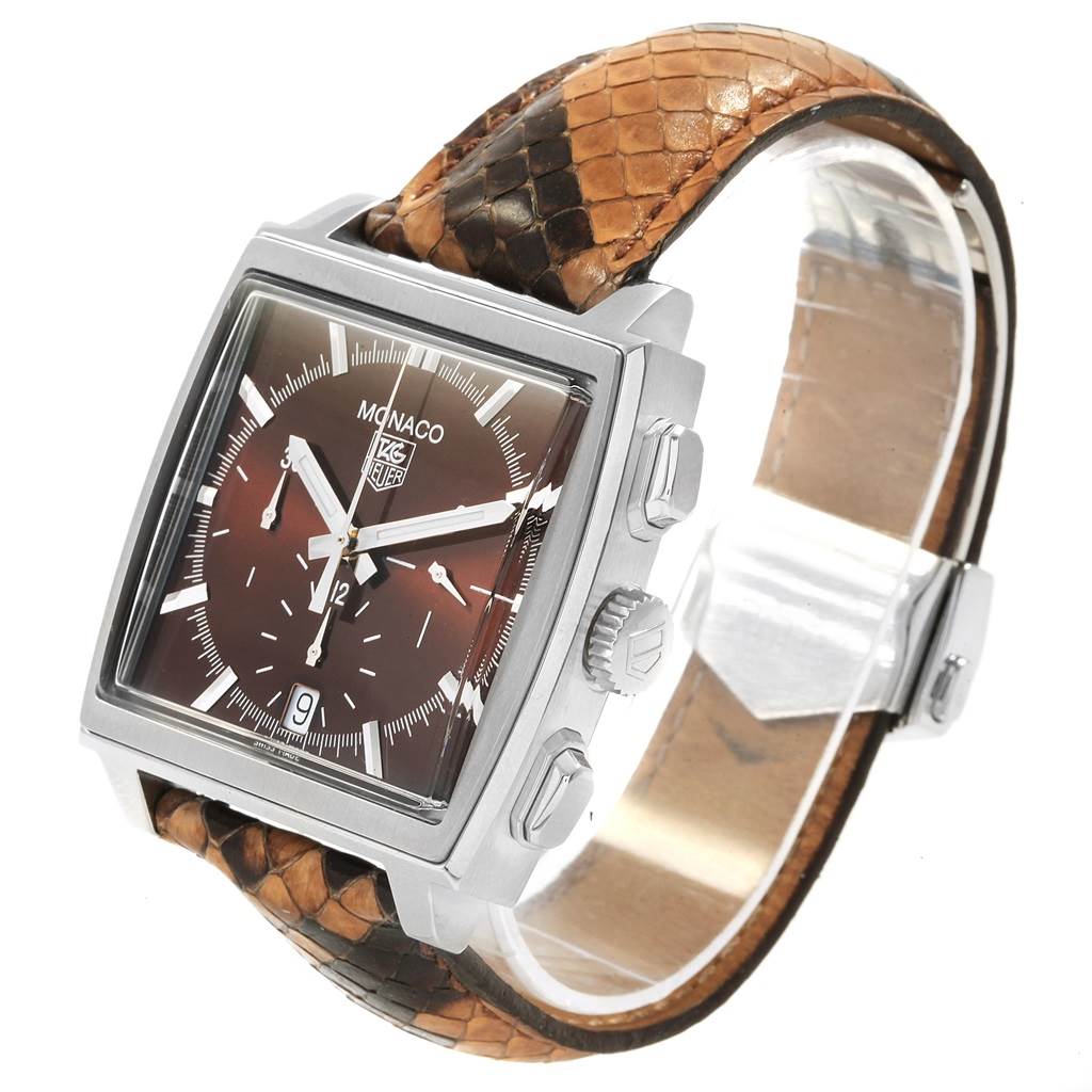 The image shows a side angle of the Tag Heuer Monaco CW2114 Men's Stainless Steel Brown Dial CW2114 Men's Stainless Steel Brown Dial watch, highlighting the brown dial, square case, and textured leather strap.