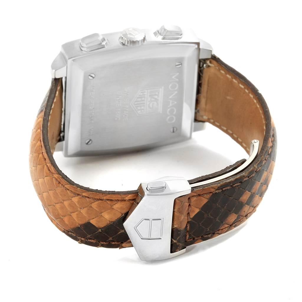 The image shows the back case, crown, pushers, and leather strap of a Tag Heuer Monaco CW2114 Men's Stainless Steel Brown Dial CW2114 Men's Stainless Steel Brown Dial watch, viewed from a rear angle.