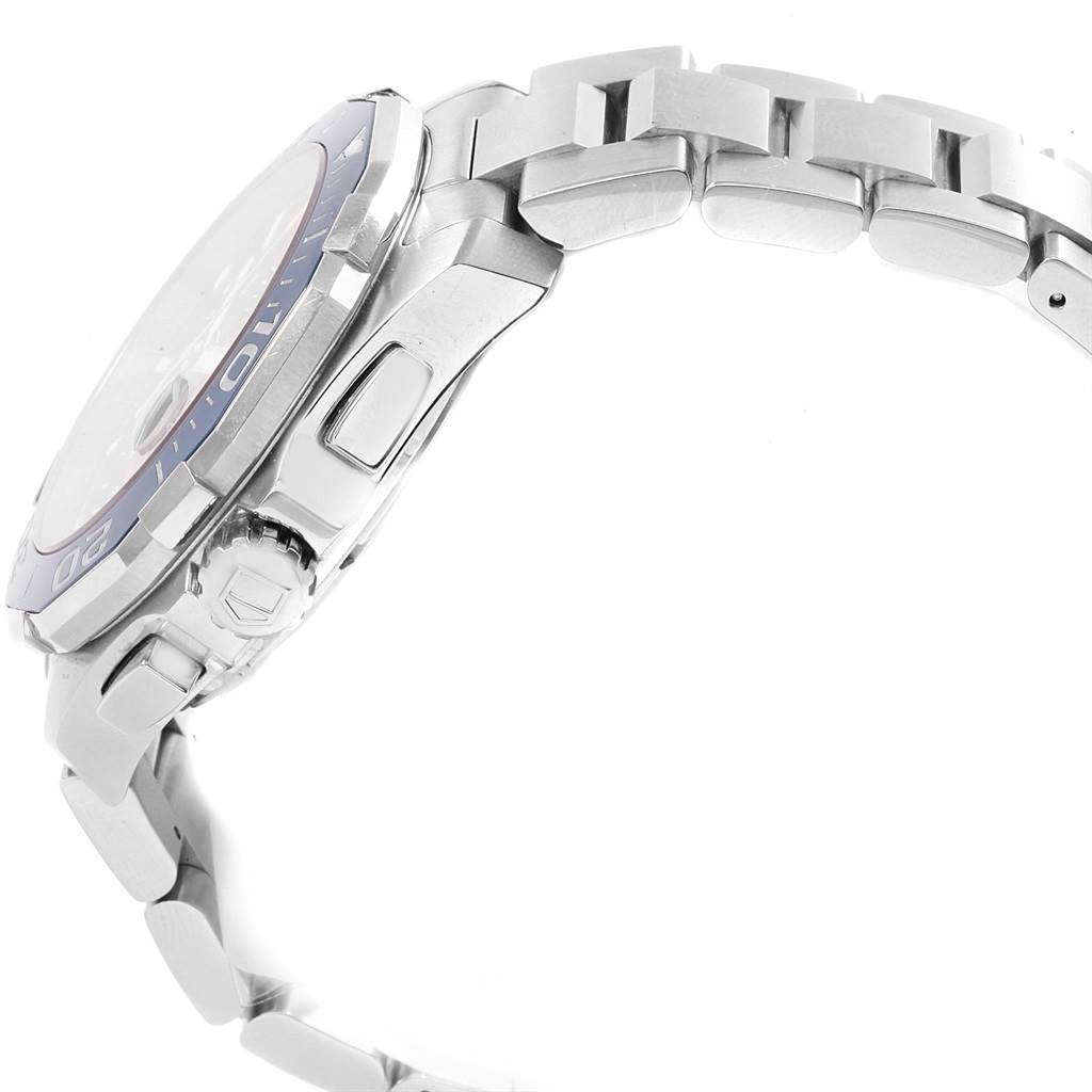 The image shows a side view of the Tag Heuer Aquaracer CAY211B.BA0927 Men's Stainless Steel Blue Dial CAY211B.BA0927 Men's Stainless Steel Blue Dial watch, highlighting the bezel, crown, and bracelet links.