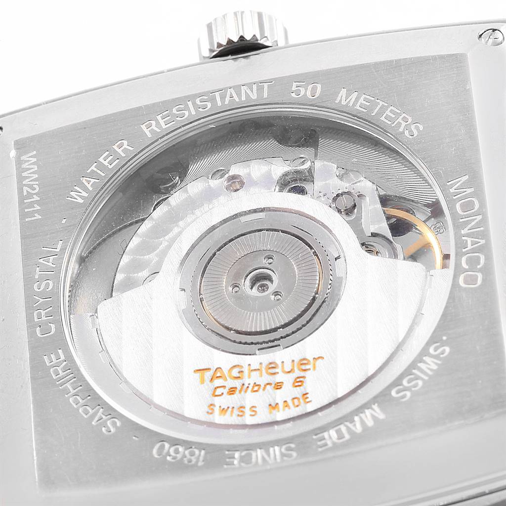 The image shows the back view of the Tag Heuer Monaco WW2111.FC6204 Men's Stainless Steel Blue Dial WW2111.FC6204 Men's Stainless Steel Blue Dial watch, revealing the Calibre 6 movement and transparent case back.