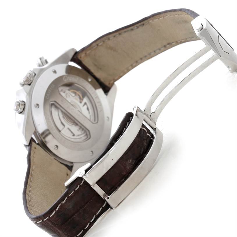 The image shows the case back and clasp of a Tag Heuer Carrera CAV511A.FC6225 Men's Stainless Steel Black Dial CAV511A.FC6225 Men's Stainless Steel Black Dial watch, highlighting its leather strap and metal deployment clasp.