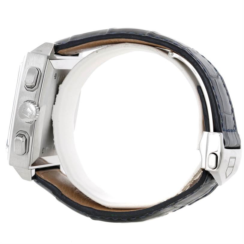 The image shows a side profile of a Tag Heuer Monaco CW2113 Men's Stainless Steel Blue Dial CW2113 Men's Stainless Steel Blue Dial watch, highlighting the case, crown, pushers, and leather strap.