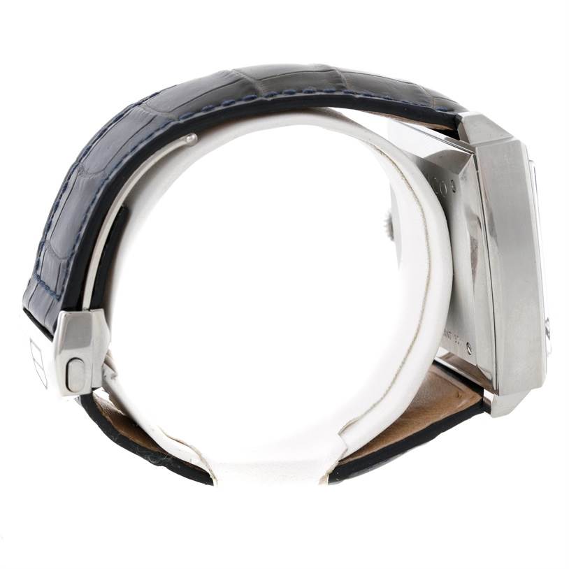 This image shows a side view of the Tag Heuer Monaco CW2113 Men's Stainless Steel Blue Dial CW2113 Men's Stainless Steel Blue Dial watch, highlighting the strap, buckle, and case.