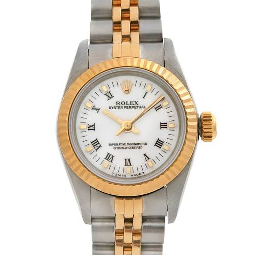 The image shows a front view of a Rolex Oyster Perpetual 67193 Women's Yellow Gold White Dial 67193 Women's Yellow Gold White Dial watch, highlighting its dial, bezel, and part of the bracelet.