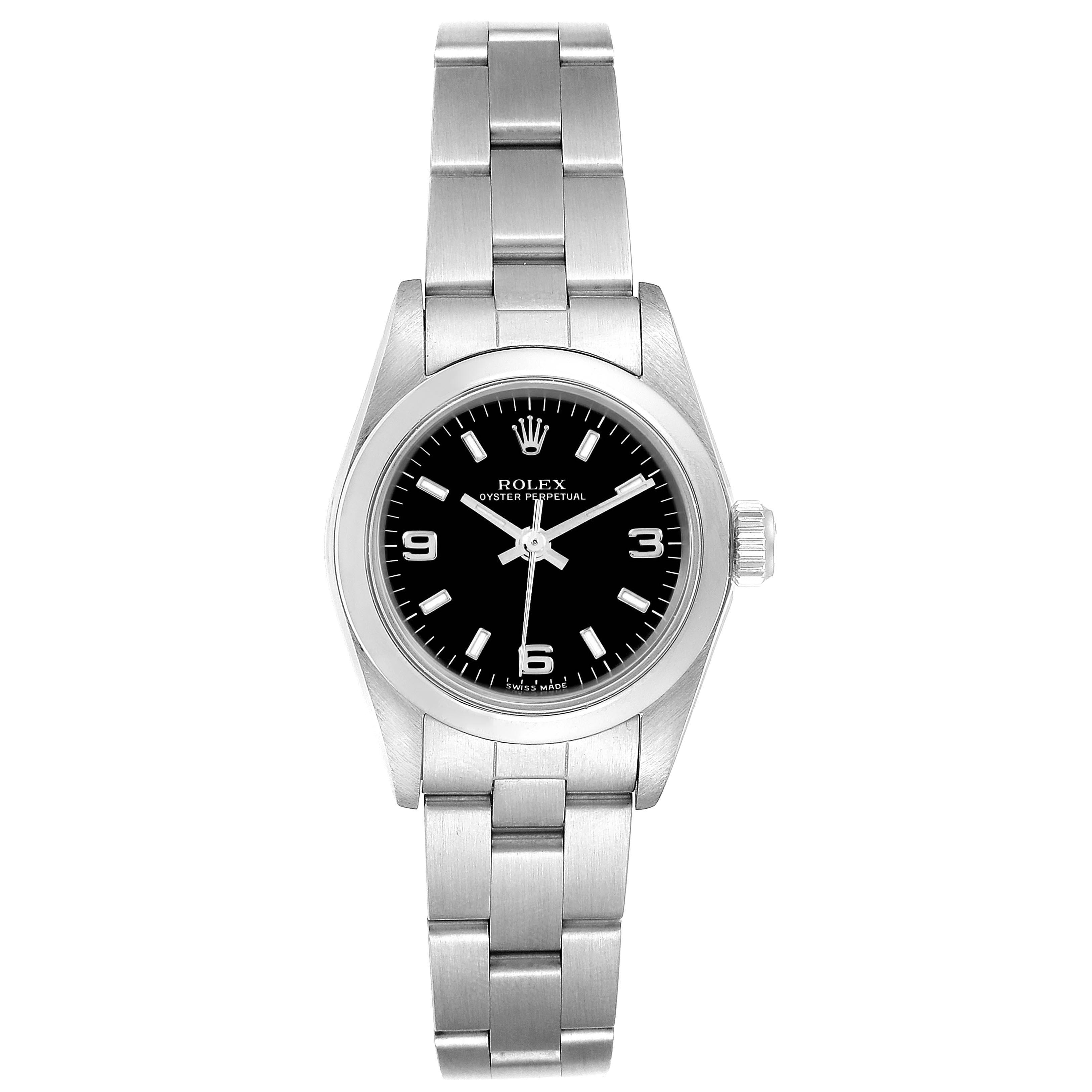 The image shows a front view of a Rolex Oyster Perpetual 76080 Women's Stainless Steel Black Dial 76080 Women's Stainless Steel Black Dial watch, focusing on the dial, bezel, and bracelet.