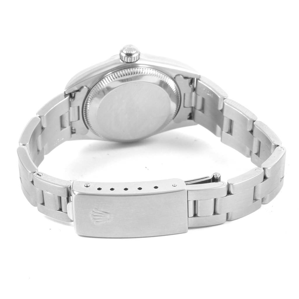 The image shows the back view of a Rolex Oyster Perpetual 76080 Women's Stainless Steel Black Dial 76080 Women's Stainless Steel Black Dial watch, including the case back, bracelet, and clasp.