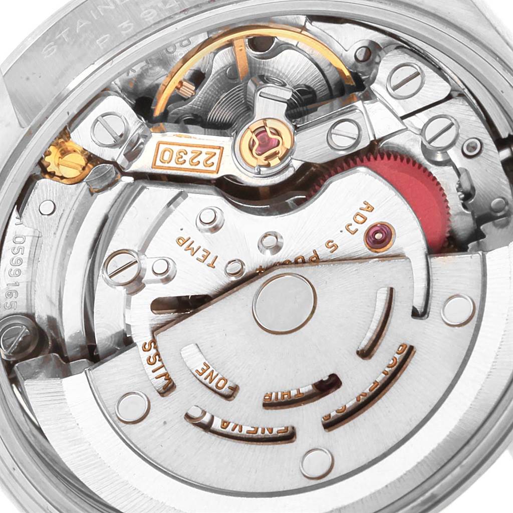 This image shows the internal mechanism of a Rolex Oyster Perpetual 76080 Women's Stainless Steel Black Dial 76080 Women's Stainless Steel Black Dial watch, featuring its intricate automatic movement components.