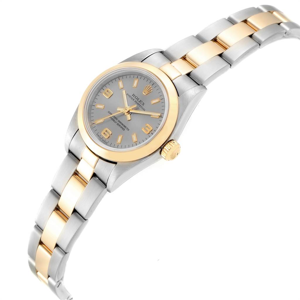 The image shows a side and front angle of a Rolex Oyster Perpetual 76183 Women's Steel and Gold (two tone) Grey Dial 76183 Women's Steel and Gold (two tone) Grey Dial watch displaying the face, bezel, and bracelet.