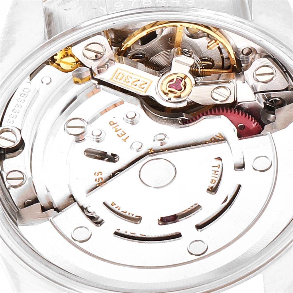 The image shows a close-up view of the internal mechanical movement of a Rolex Oyster Perpetual 76183 Women's Steel and Gold (two tone) Grey Dial 76183 Women's Steel and Gold (two tone) Grey Dial watch.