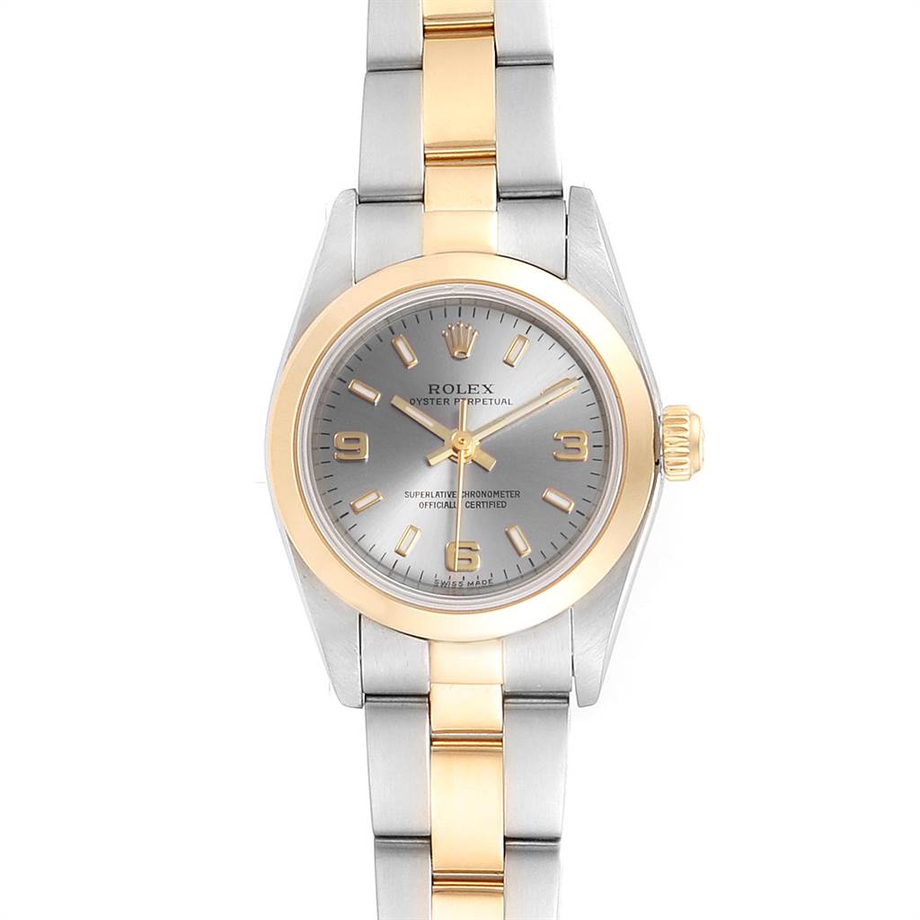 The image shows a Rolex Oyster Perpetual 76183 Women's Steel and Gold (two tone) Grey Dial 76183 Women's Steel and Gold (two tone) Grey Dial watch from a top-down angle, displaying its face, bezel, and part of its bracelet.