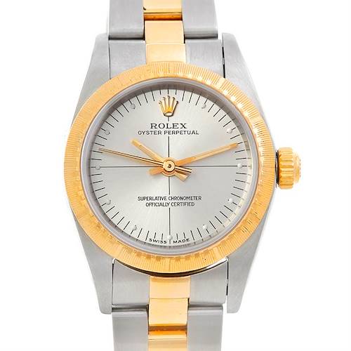 This image shows a frontal view of a Rolex Oyster Perpetual 76243 Women's Steel and Gold (two tone) Silver Dial 76243 Women's Steel and Gold (two tone) Silver Dial watch, highlighting the dial, bezel, and bracelet.