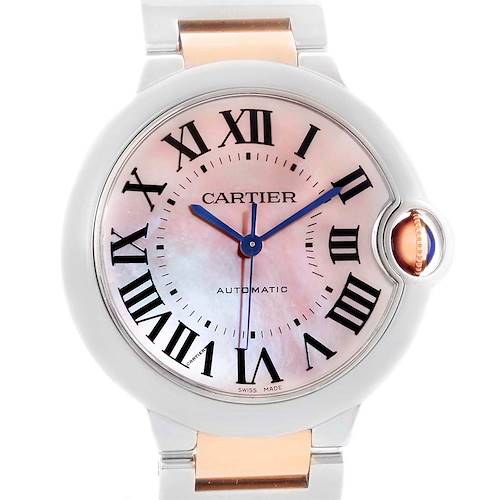The image shows a front view of a Cartier Ballon Bleu W6920070 Women's Steel and Gold (two tone) Mother of Pearl Dial W6920070 Women's Steel and Gold (two tone) Mother of Pearl Dial model, highlighting its round case, Roman numeral dial, and blue sword-shaped hands.