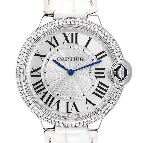 The image shows a frontal view of the Cartier Ballon Bleu WE902056 Women's White Gold Silver Dial WE902056 Women's White Gold Silver Dial watch, highlighting its dial, Roman numerals, and bejeweled bezel.