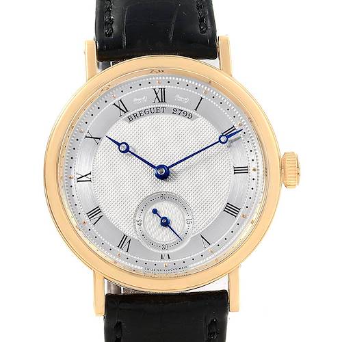 This image shows a front view of a Breguet Classique 5907BA/12/984 Yellow Gold Silver Dial 5907BA/12/984 Yellow Gold Silver Dial watch, including its dial, case, crown, and leather strap.