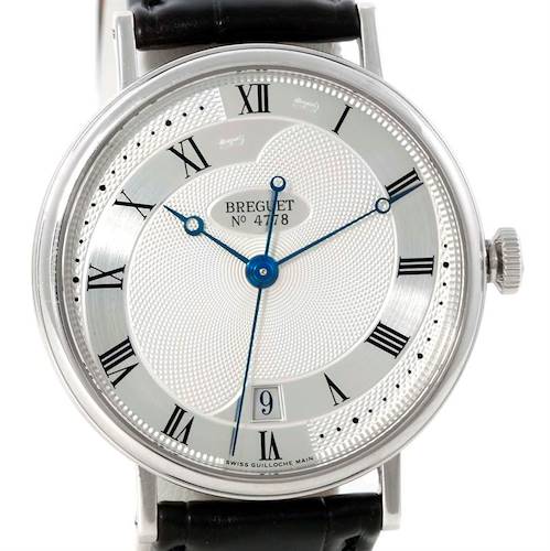 This image shows a frontal view of the Breguet Classique 5197BB/15/986 Men's White Gold Silver Dial 5197BB/15/986 Men's White Gold Silver Dial watch face, with Roman numerals and blue hands.