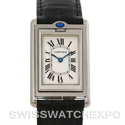 The Cartier Tank Basculante Stainless Steel Silver Dial Stainless Steel Silver Dial watch is shown from a front angle, displaying its face, Roman numeral markers, and a portion of its black strap.
