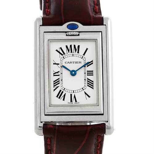 The image shows a front view of the Tank Basculante model by Cartier, highlighting its rectangular face, Roman numerals, and leather strap.